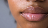 closeup glossy woman's lips
