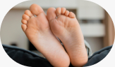 close-up of the soles of a person’s feet