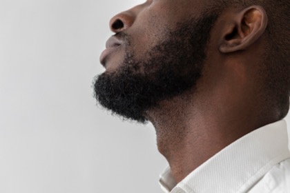 side profile of a man’s chin