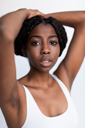 close-up of a woman’s underarm and shoulder